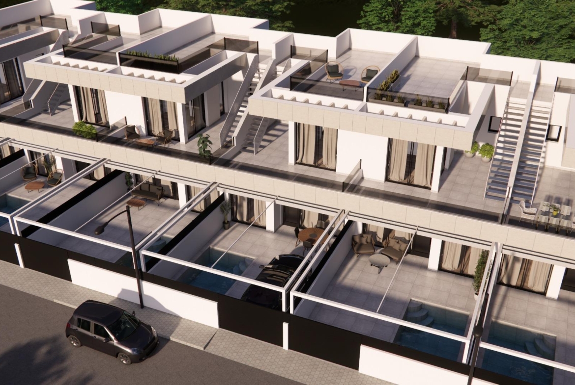 Modern new build 3-bedroom townhouse in Rojales with sleek architecture, private terraces, spacious open-plan living, and pool views.