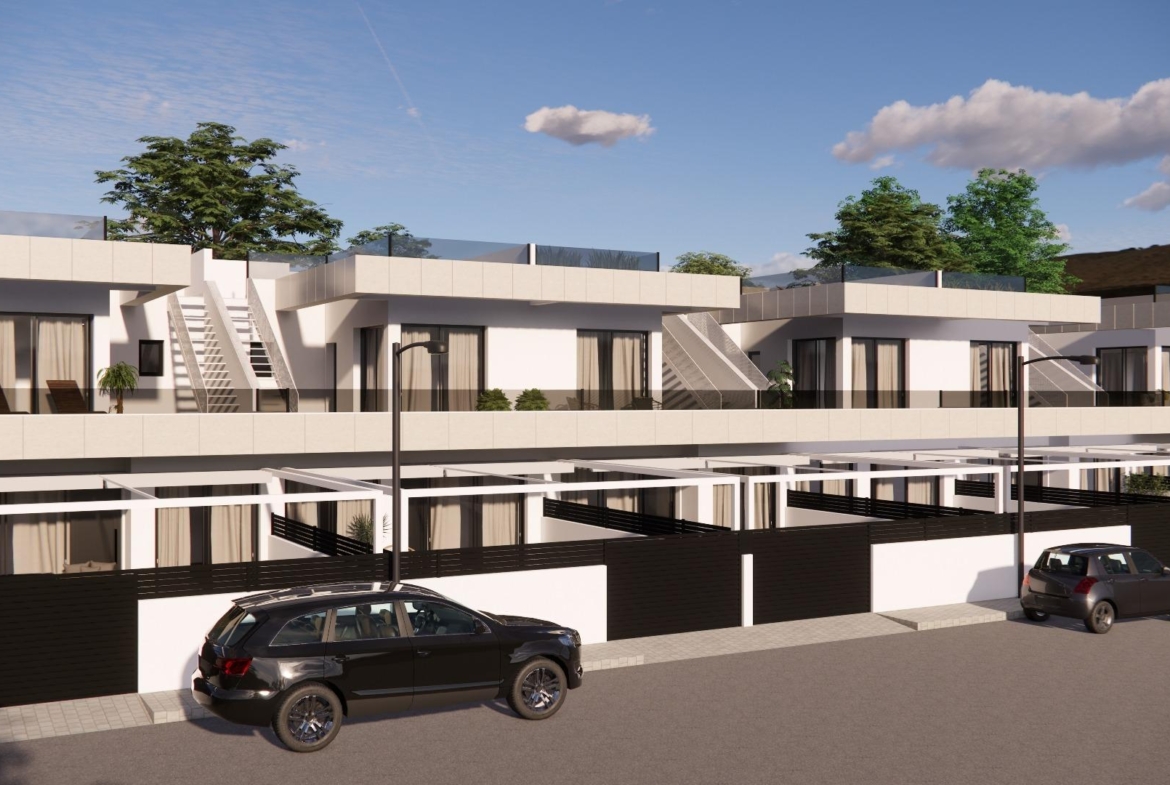 Sleek modern 3-bedroom townhouse in Rojales with private rooftop terraces, sunlit open-plan design, and contemporary architecture.