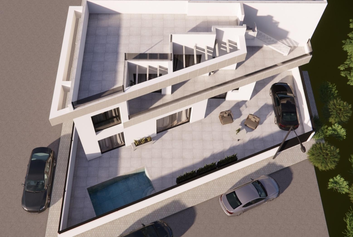 Modern 3-bedroom townhouse in Rojales featuring a private pool, spacious sunlit terrace, and sleek open-plan design.