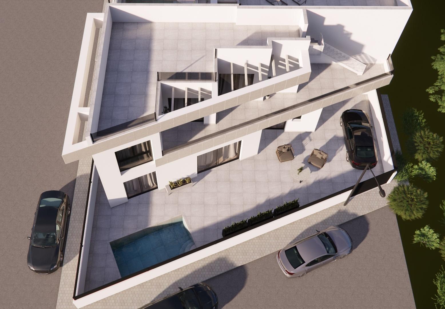 Modern 3-bedroom townhouse in Rojales featuring a private pool, spacious sunlit terrace, and sleek open-plan design.