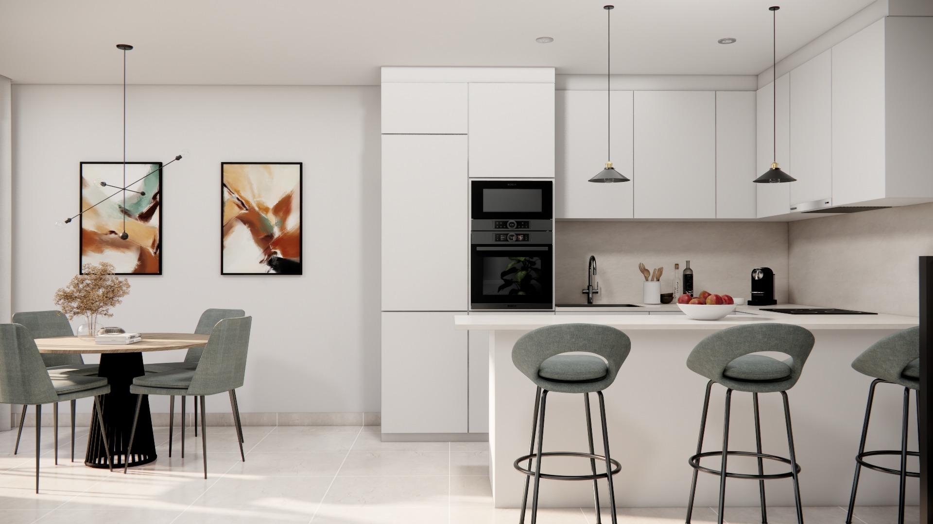 Bright modern open-plan kitchen and dining area in luxury 3 bedroom townhouse with private pool in Rojales.