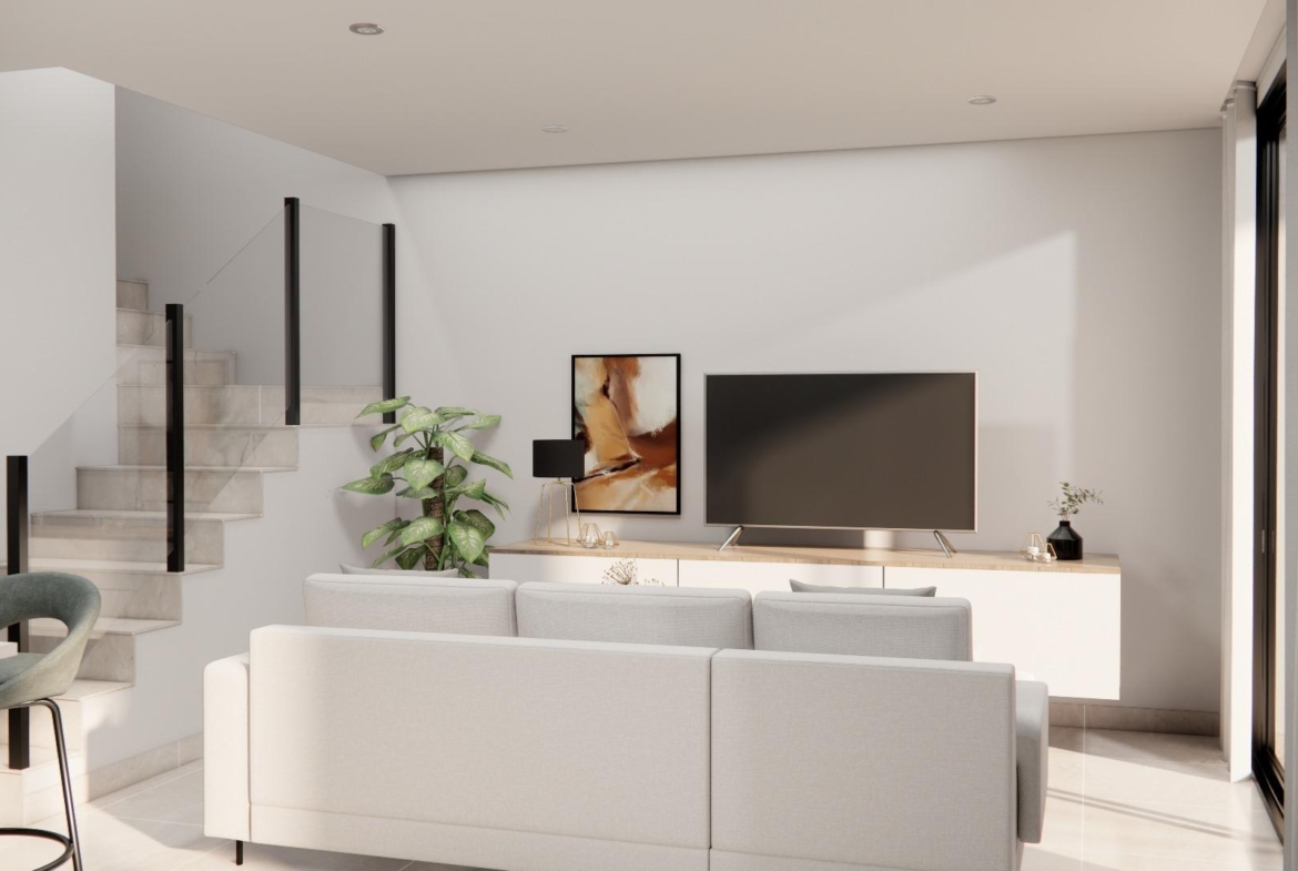 Bright and modern living room in a stylish 3-bedroom townhouse with sleek stairs and sunlit interiors in Rojales.