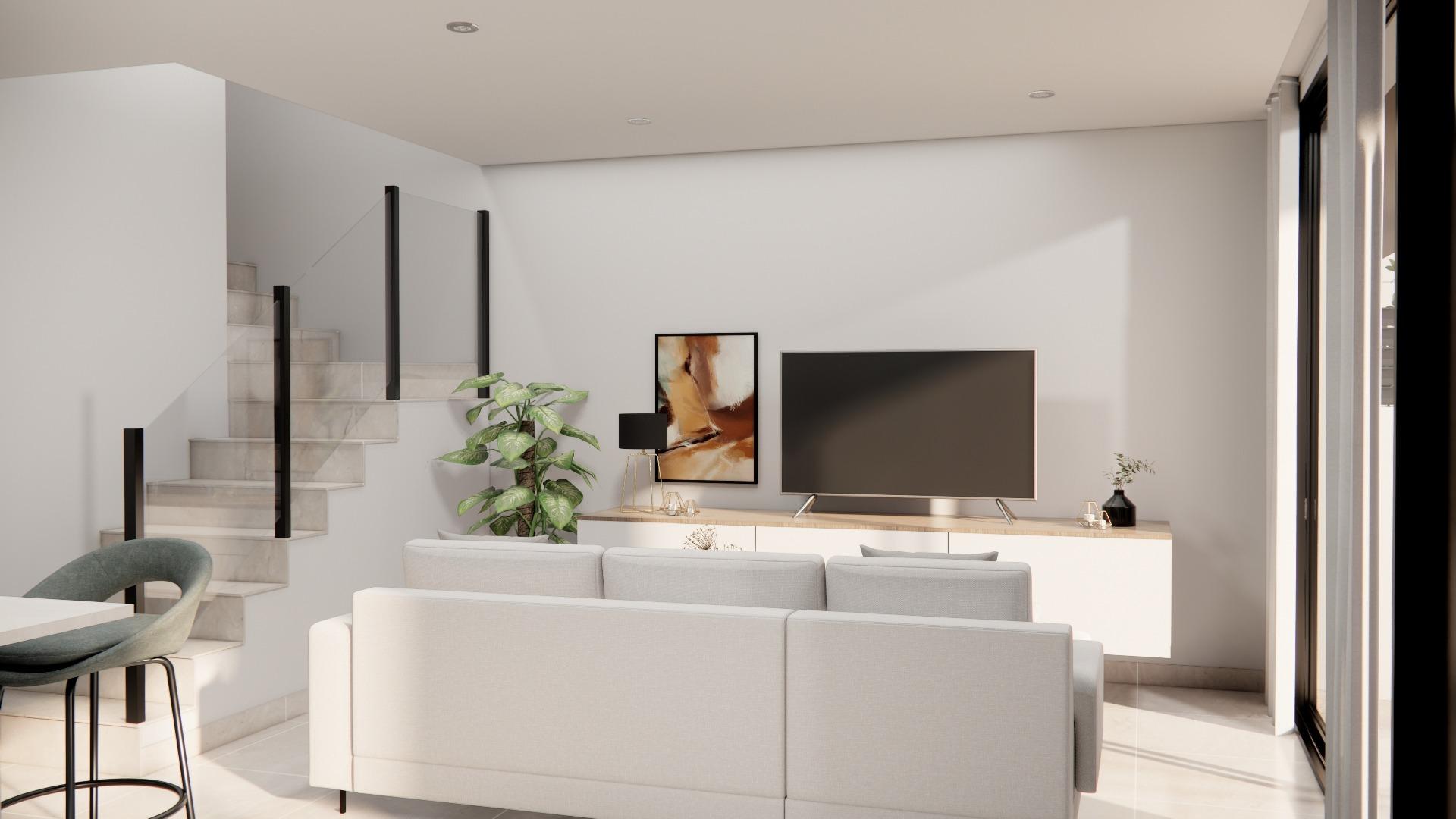 Bright and modern living room in a stylish 3-bedroom townhouse with sleek stairs and sunlit interiors in Rojales.