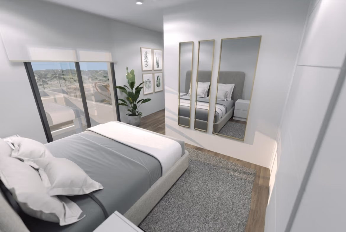 Bright and modern 3-bedroom villa bedroom in Finestrat featuring sleek design and views towards the sea.