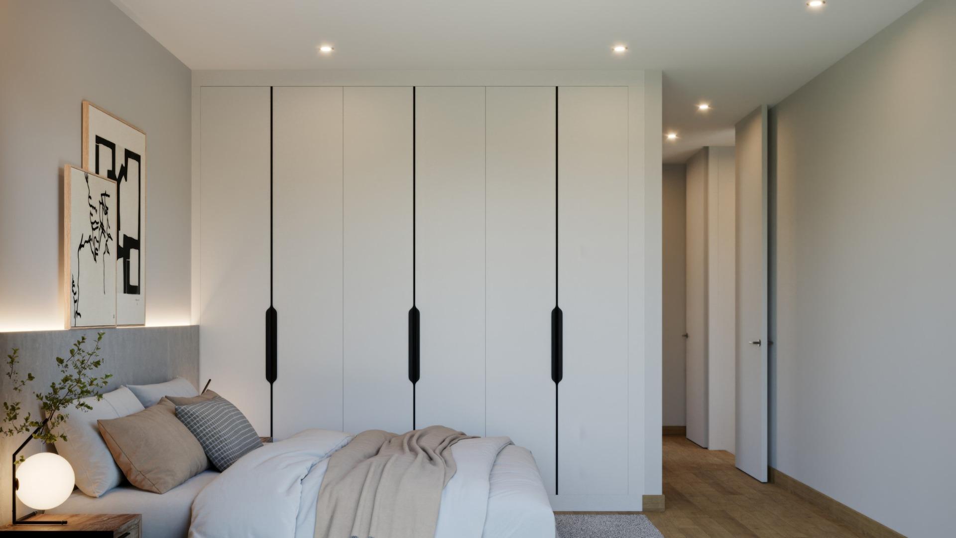 Bright and modern bedroom with built-in wardrobes in exclusive 3 bedroom villa with sea views in Sierra Cortina, Finestrat