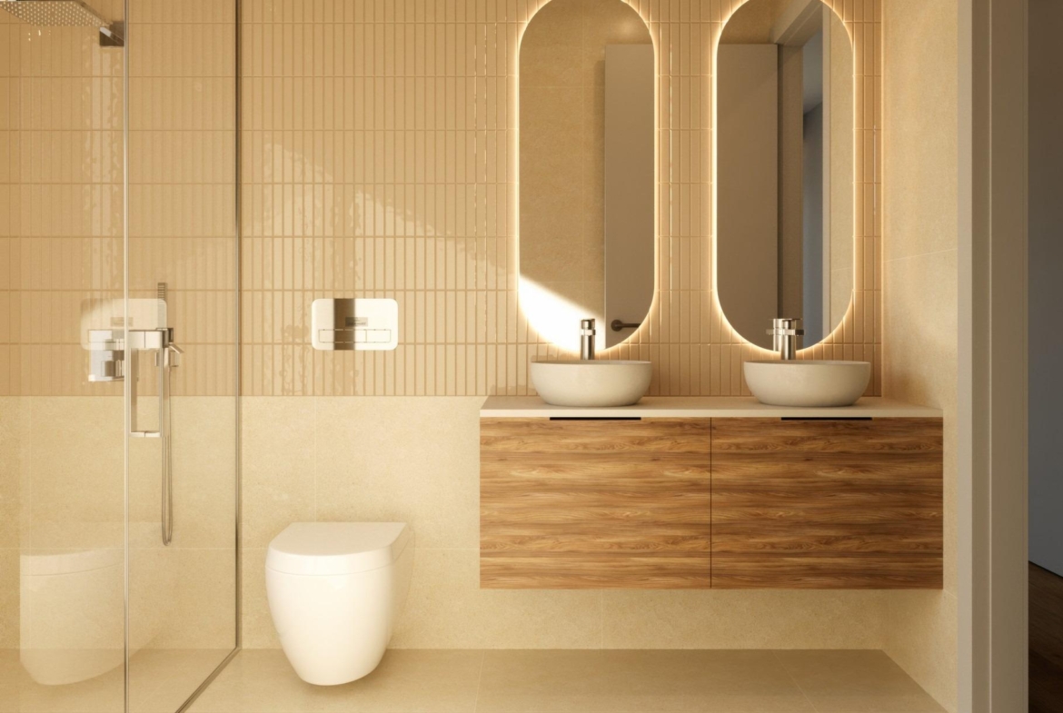 Modern sun-drenched bathroom with double illuminated mirrors and wood vanity in exclusive Sierra Cortina villa, Finestrat.