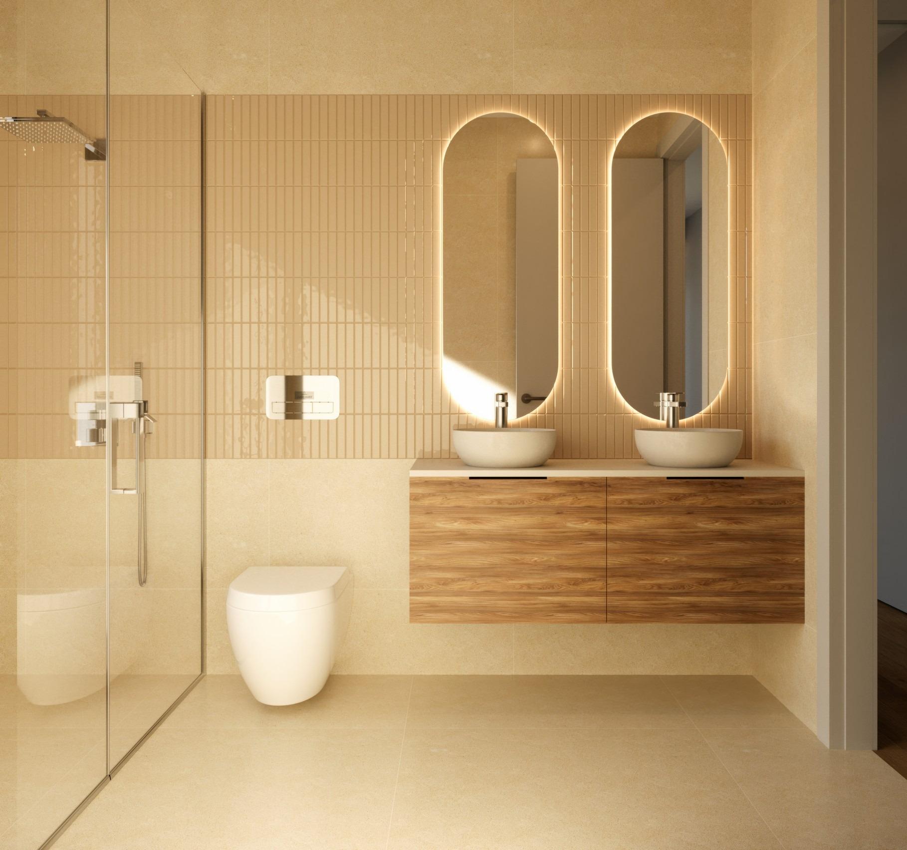 Modern sun-drenched bathroom with double illuminated mirrors and wood vanity in exclusive Sierra Cortina villa, Finestrat.
