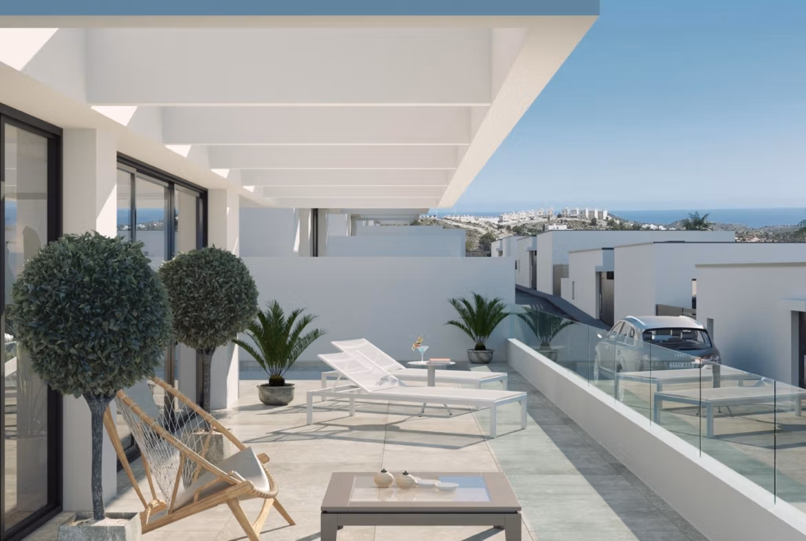 Sun-drenched terrace of modern 3 bedroom villa in Finestrat with private pool, stylish seating, and panoramic sea views.