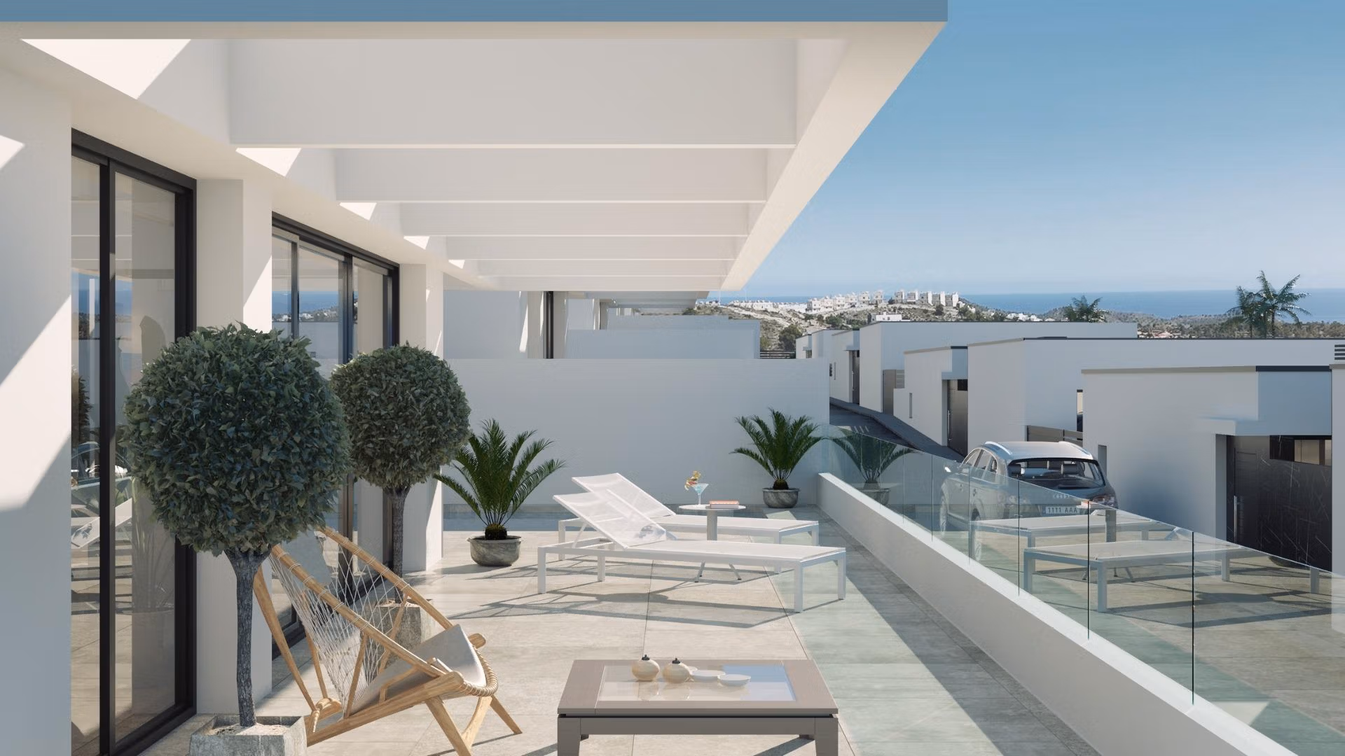 Sun-drenched terrace of modern 3 bedroom villa in Finestrat with private pool, stylish seating, and panoramic sea views.