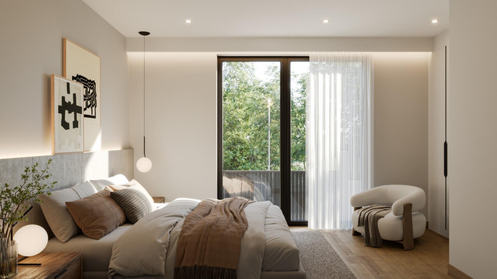 Bright, elegant bedroom with plush bedding and natural light in exclusive 3-bedroom villa, Sierra Cortina, Finestrat.