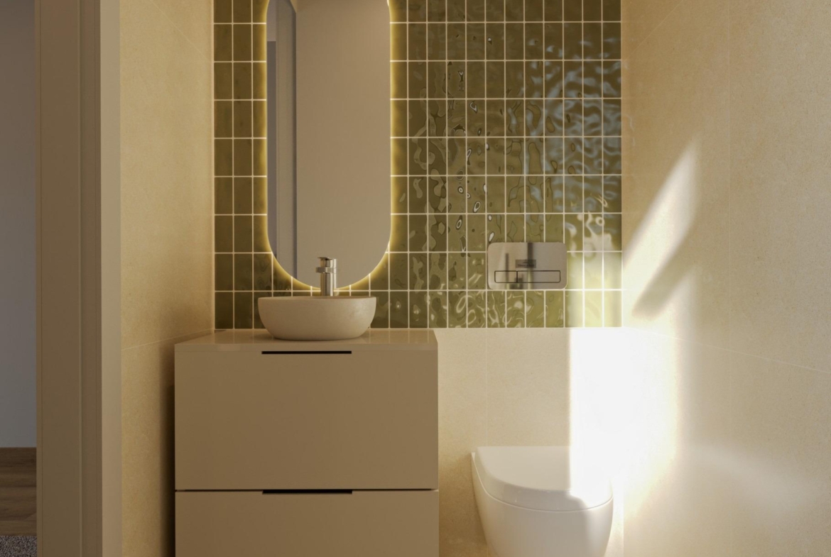 Bright modern bathroom with elegant illuminated oval mirror and sleek fixtures in exclusive Sierra Cortina villa.