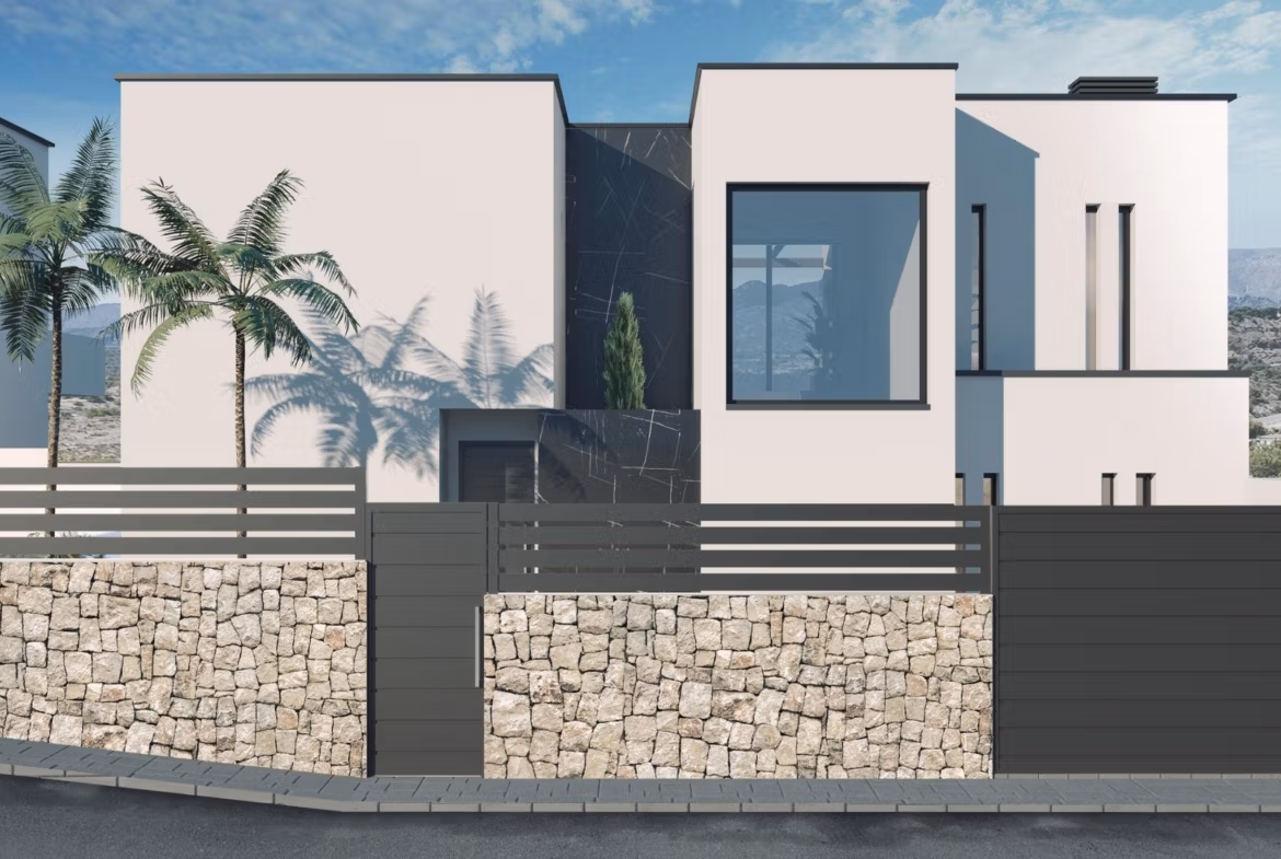 Modern three-bedroom villa in Finestrat with sleek exterior, stone wall, and distant panoramic sea views under a clear sky.