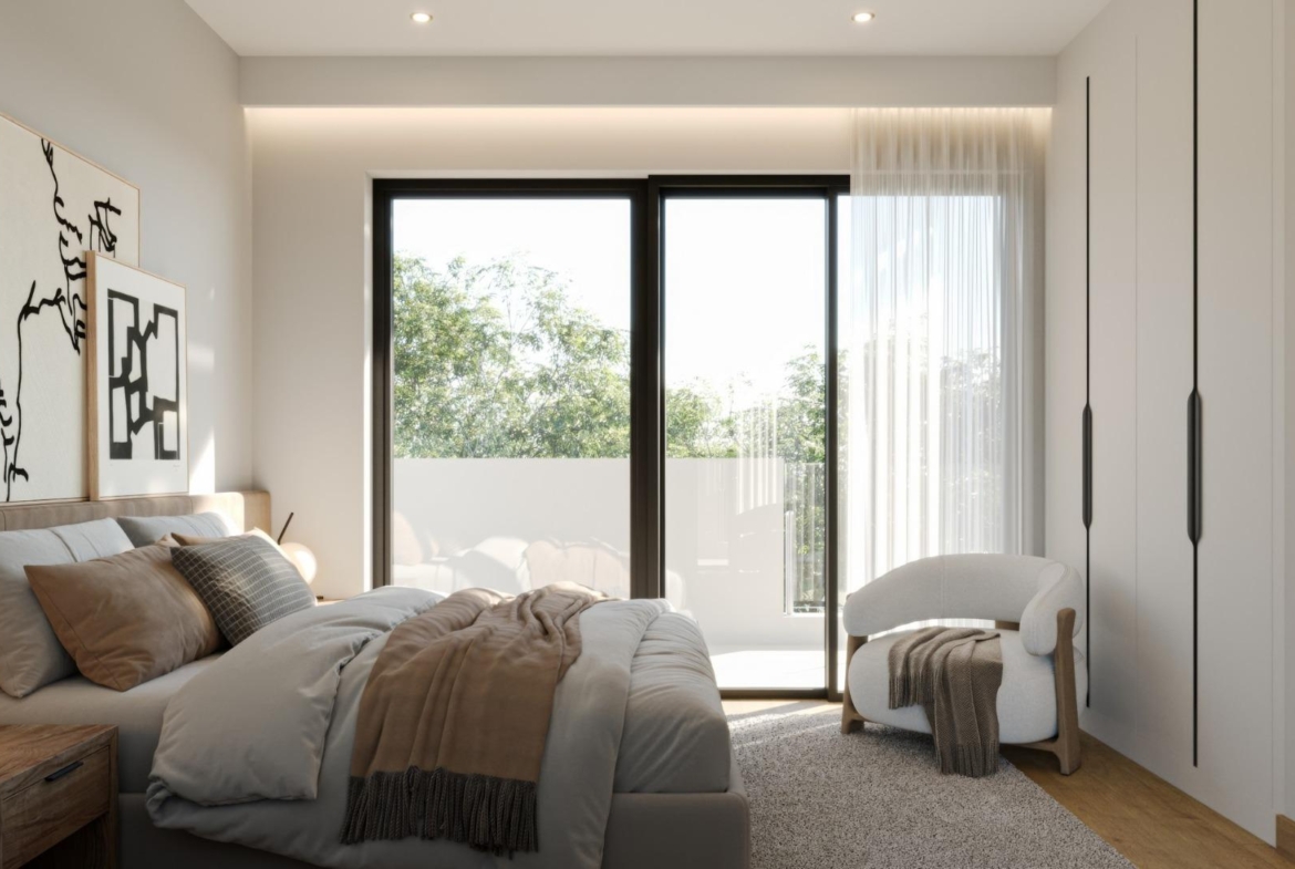 Bright and elegant 3-bedroom villa bedroom with floor-to-ceiling windows and natural views in Sierra Cortina, Finestrat.