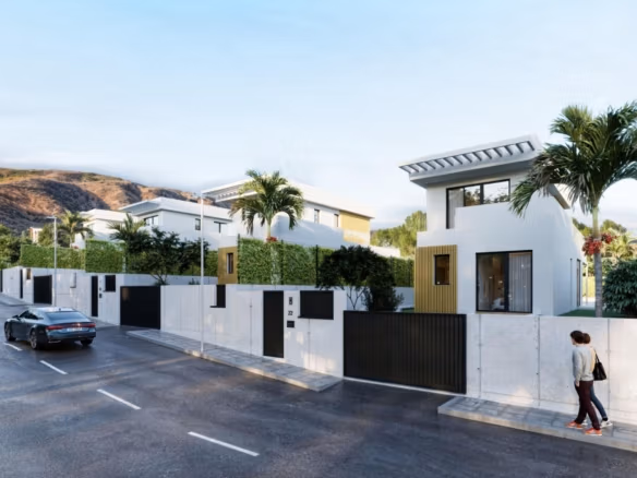 Moderne exclusieve villa met 3 slaapkamers, strakke buitenkant, weelderige beplanting en rustgevend zeezicht in Sierra Cortina, Finestrat.