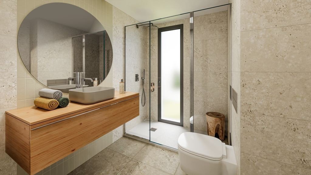 Elegant modern bathroom with sleek fixtures and natural light in a 3-bedroom villa in Sierra Cortina, Finestrat.