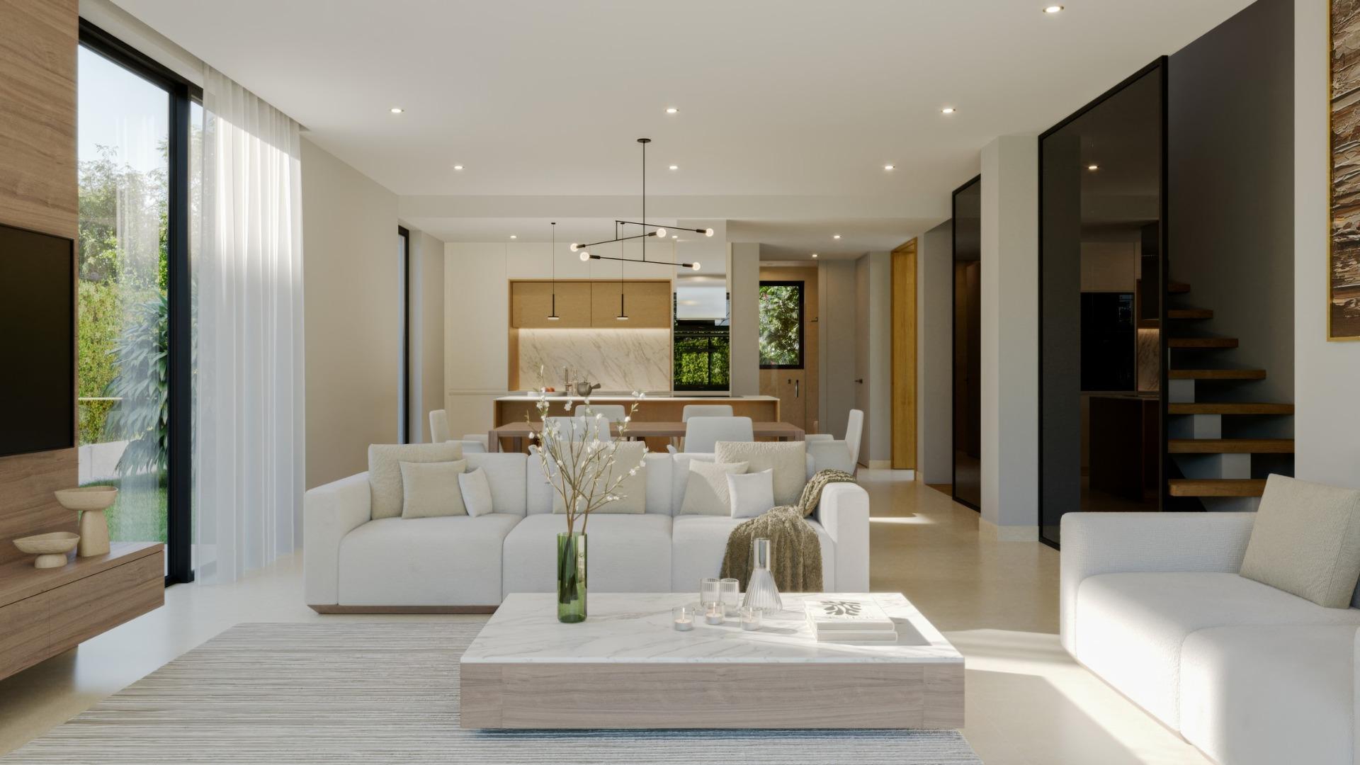 Sun-drenched open-plan living and dining area in a modern 3-bedroom villa at Sierra Cortina, Finestrat.