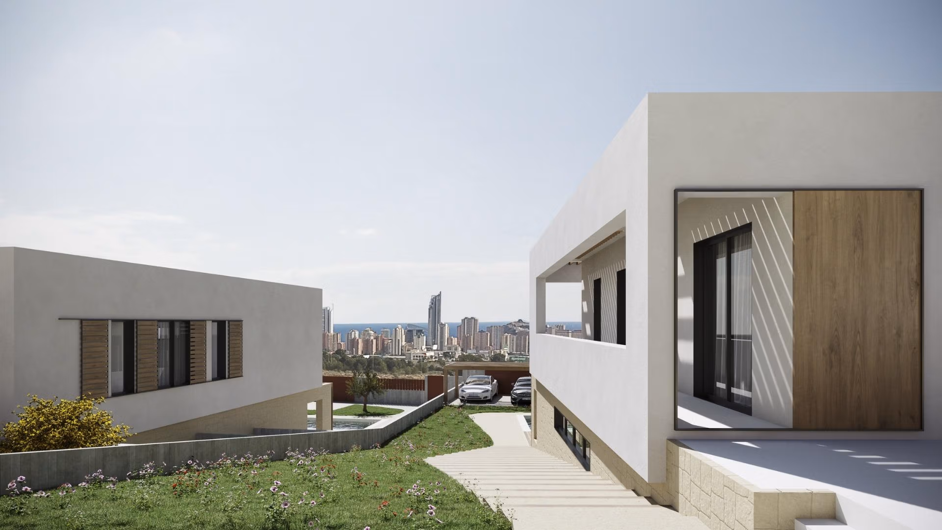NEW-BUILD-VILLAS-IN-FINESTRAT-8 Modern luxury villa exterior in Finestrat with private terrace, landscaped garden, and panoramic sea views of Benidorm skyline.