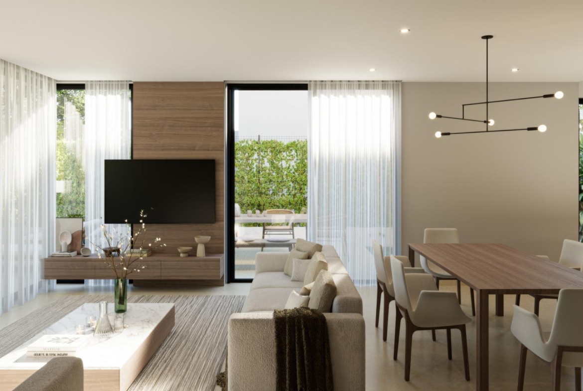 Bright, modern open-plan living and dining area in exclusive 3-bedroom villa with sea views in Sierra Cortina, Finestrat.