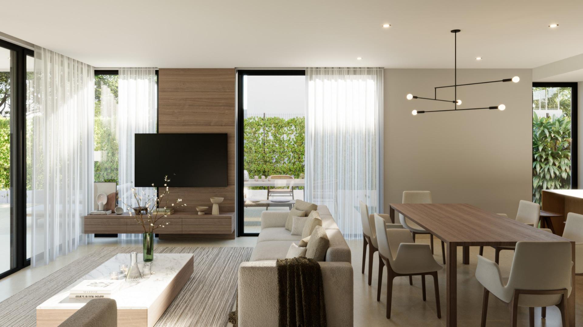 Bright, modern open-plan living and dining area in exclusive 3-bedroom villa with sea views in Sierra Cortina, Finestrat.
