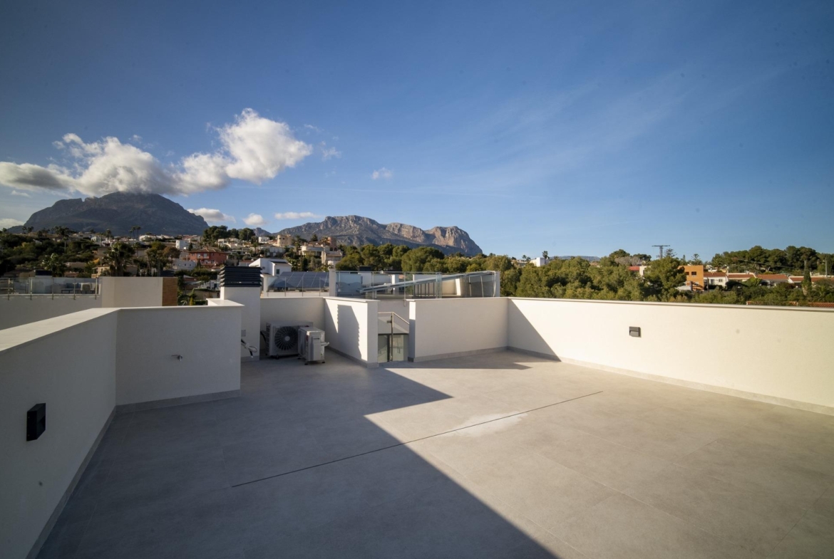 Spacious sun-drenched terrace with panoramic mountain views in a modern 3 bedroom villa in La Nucia, Costa Blanca