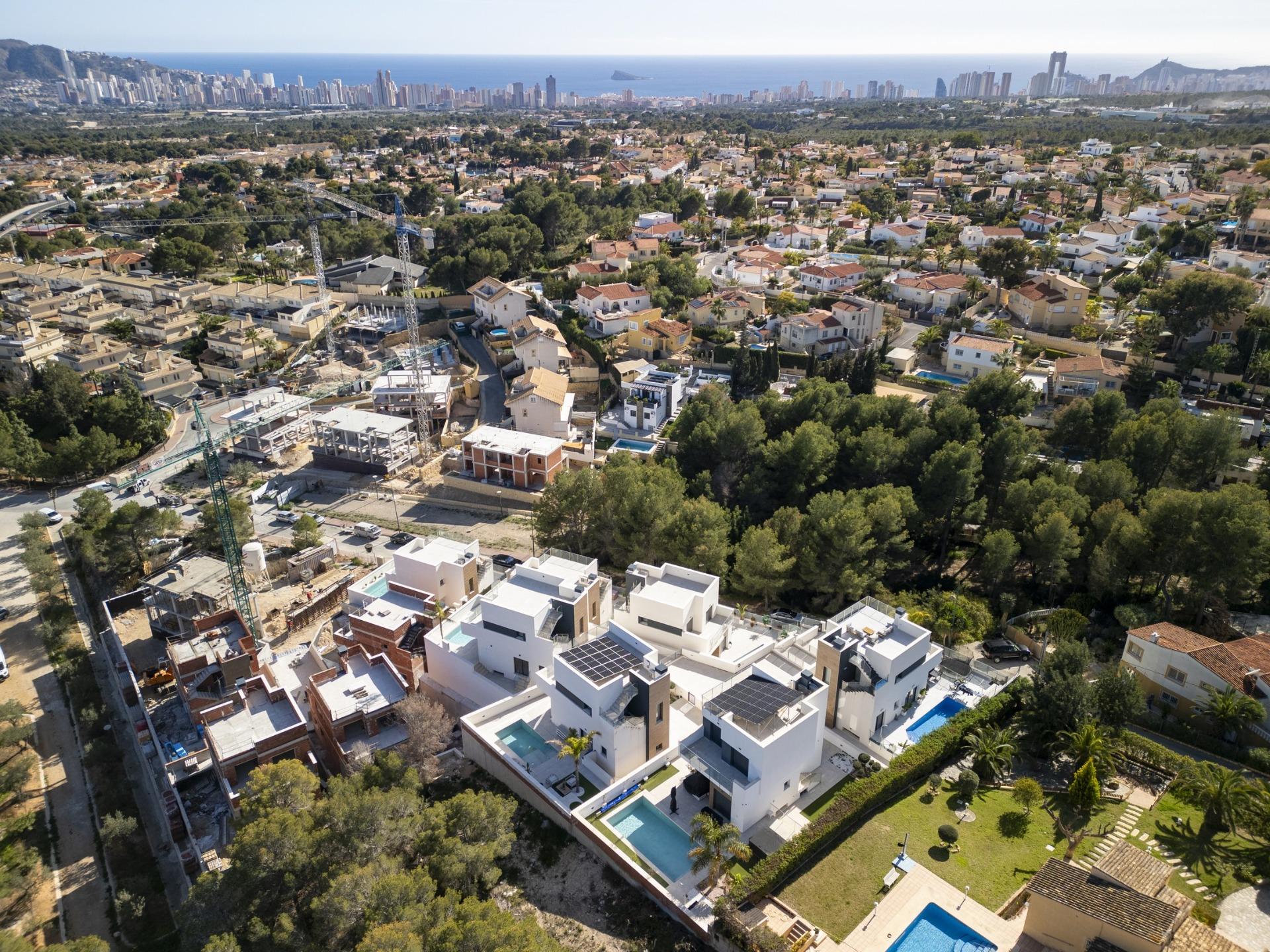 Sun-drenched modern 3-bedroom villa with private pool, spacious terrace, and lush gardens in La Nucia, Costa Blanca.