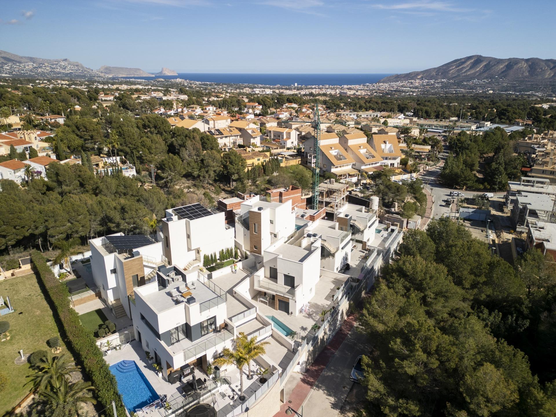 Stunning modern 3-bedroom villa with private pool, spacious terraces, and panoramic sea views in La Nucia, Costa Blanca.