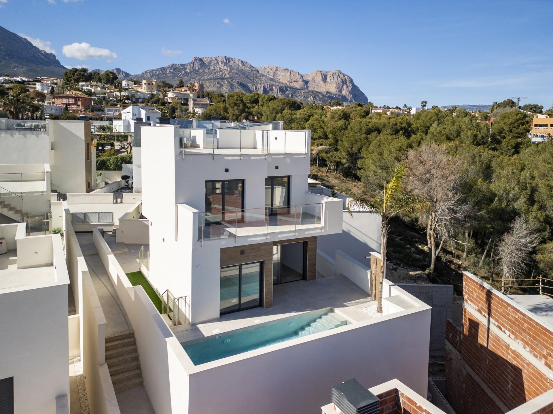 Stunning modern 3-bedroom villa in La Nucia with private sun-drenched pool and panoramic mountain views on Costa Blanca.