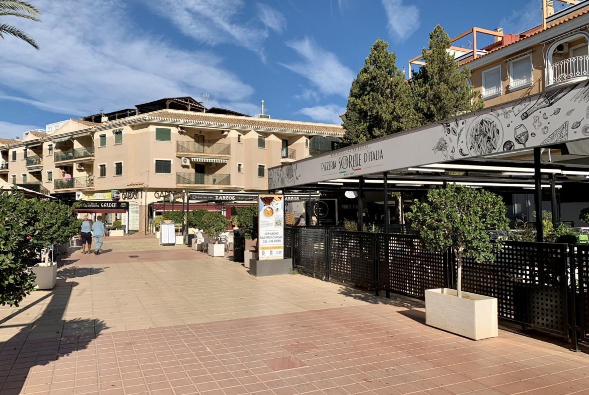 Sunlit vibrant terrace and dining area near exclusive new build villas with private pools in Los Alcázares, Murcia.