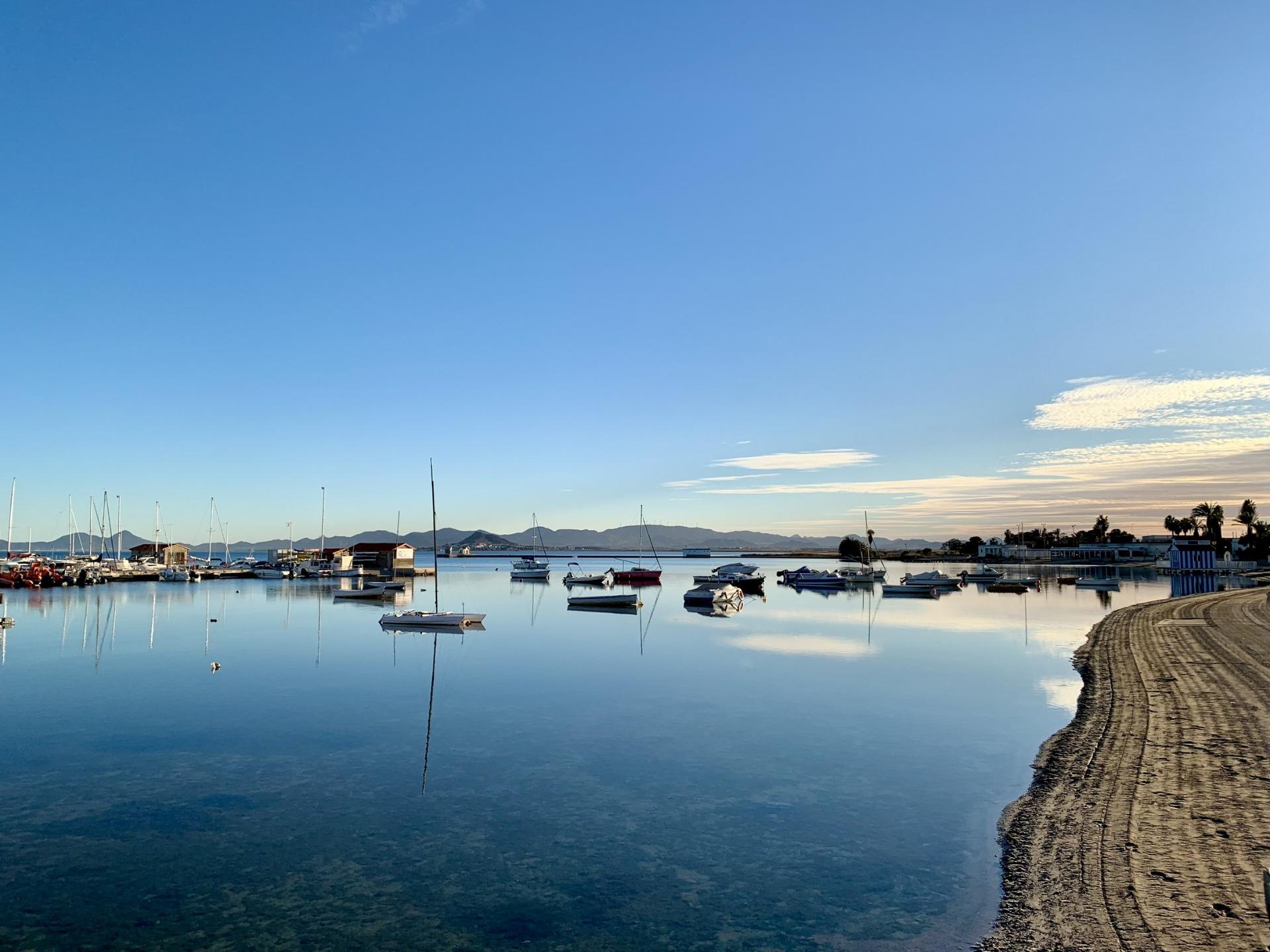 Tranquil waterfront view near exclusive new build villas with private pools, just 150m from the beach in Los Alcázares, Murcia.