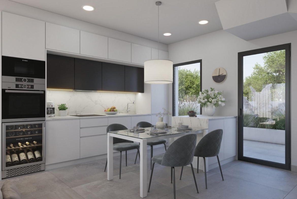 Bright modern kitchen and dining area in exclusive new build villa with garden access near Los Alcázares beach, Murcia