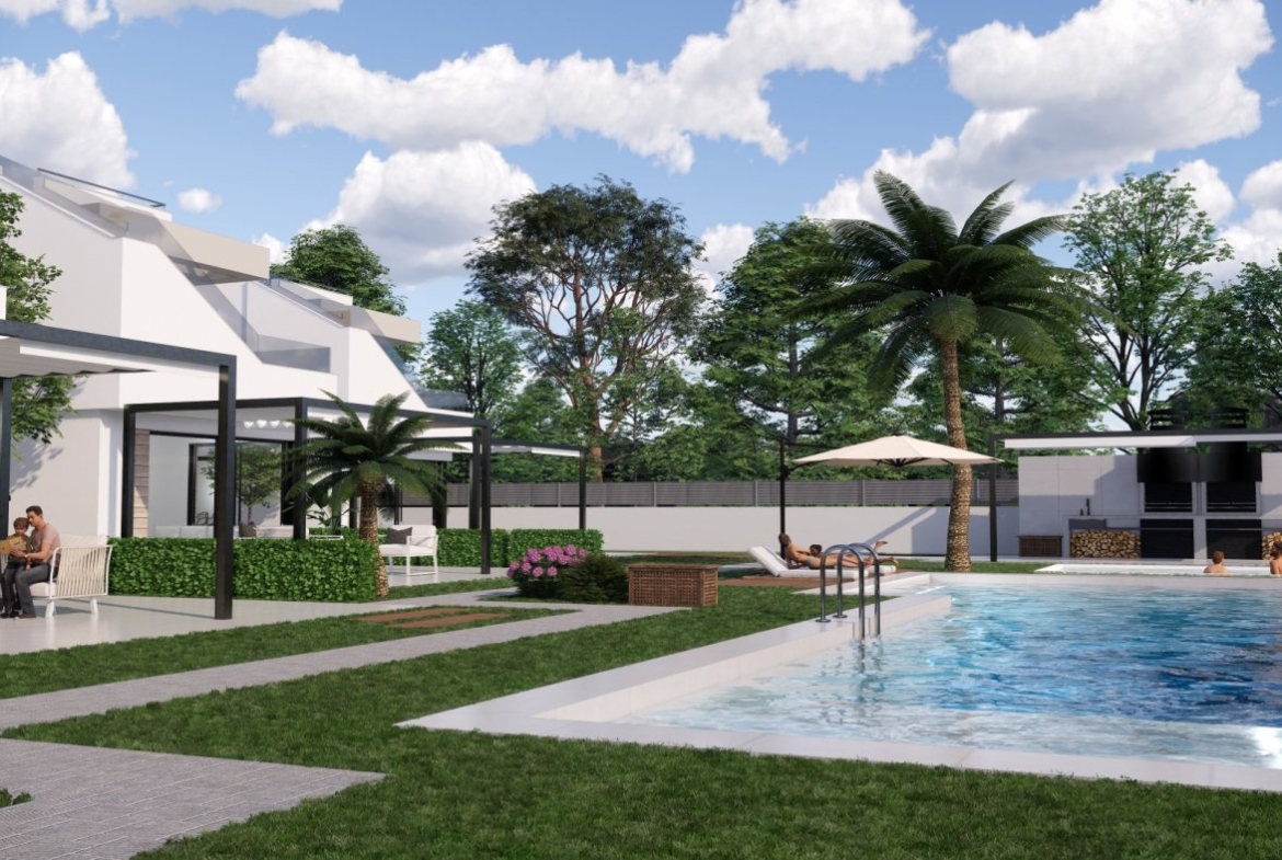 Modern new build villas in Pilar de la Horadada featuring a spacious sunlit pool area surrounded by lush landscaping and palm trees.
