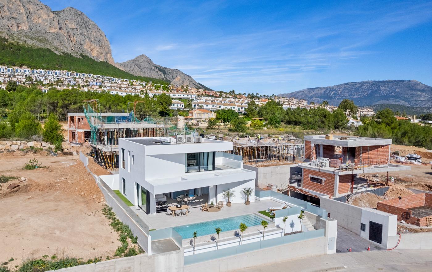 Modern 3-bedroom villa under construction with private pool and panoramic mountain views in Polop, Costa Blanca.