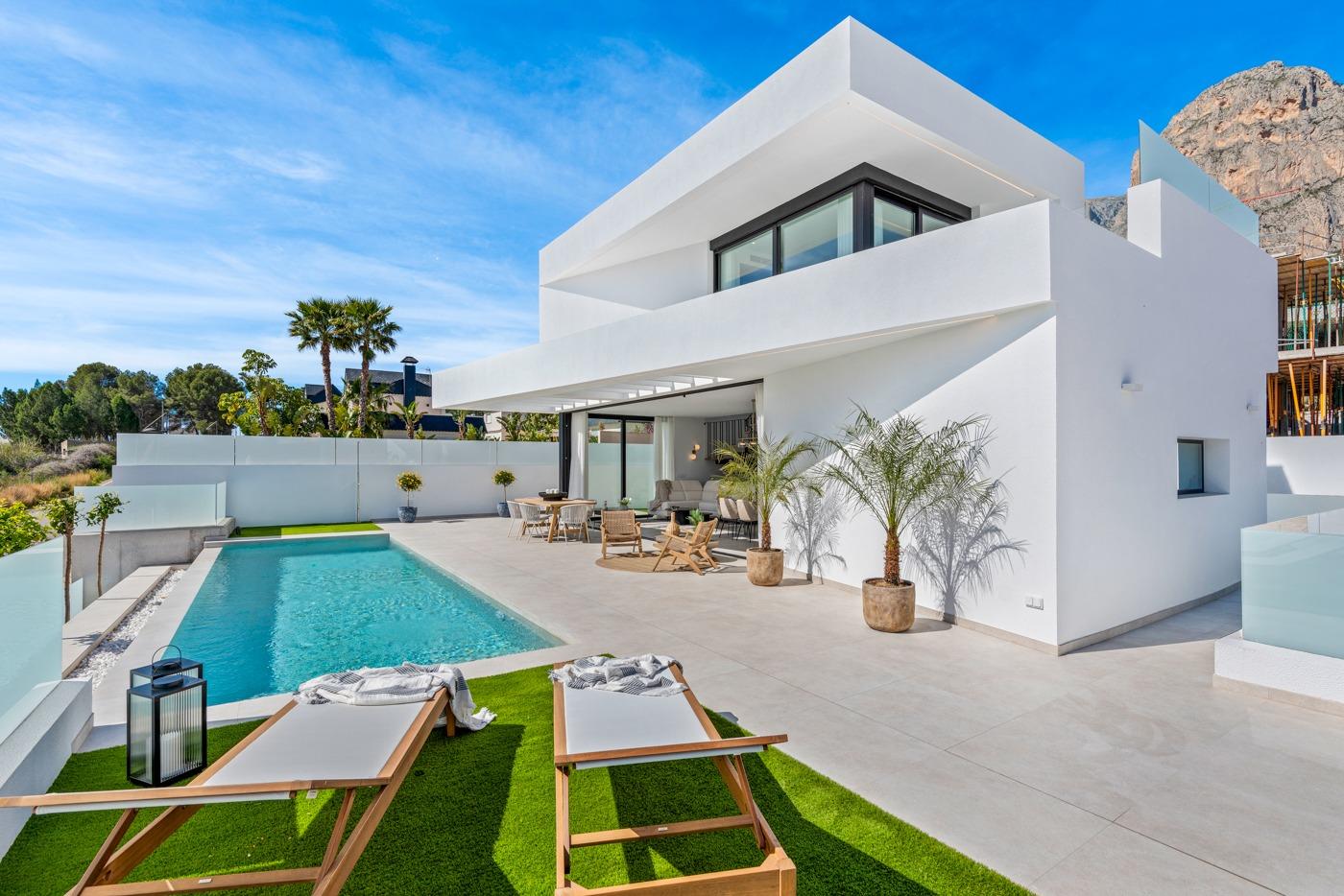 Modern 3-bedroom villa with private pool, sun-drenched terrace, and mountain views in Polop, Costa Blanca.