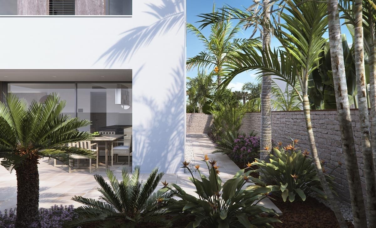 Modern luxury villa exterior with lush landscaped garden and sunlit terrace in Torre de la Horadada new build villas