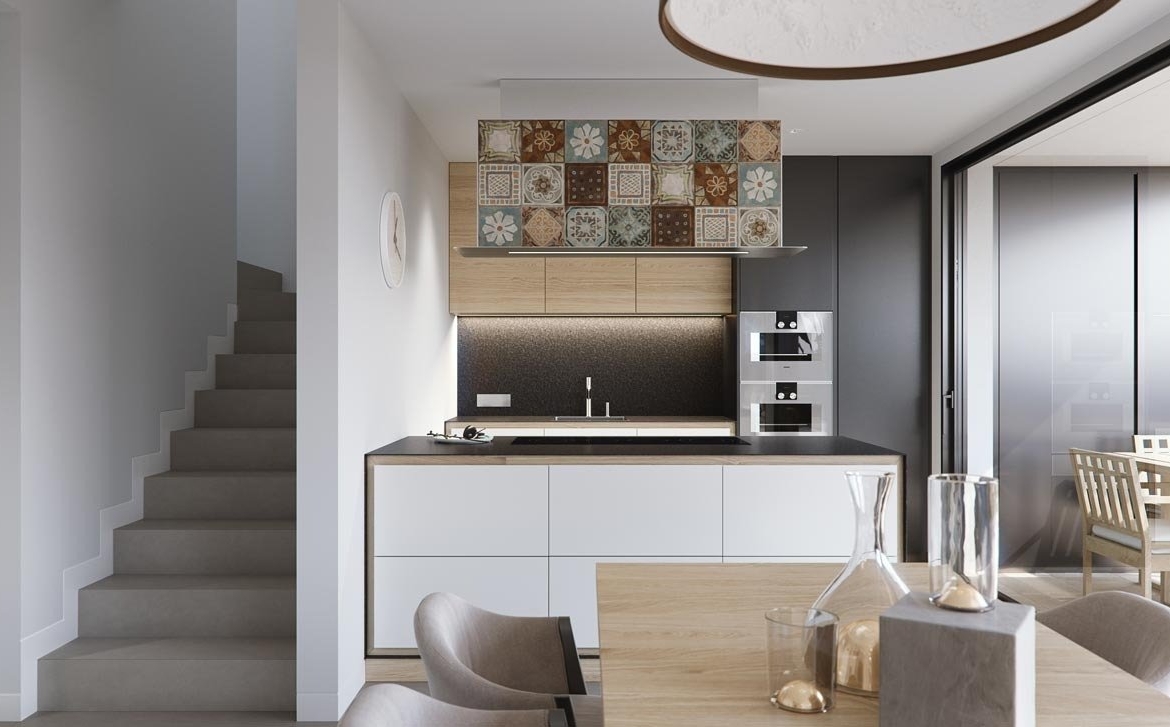 Modern, bright open-plan kitchen and dining area in new build villas in Torre de la Horadada with elegant tile backsplash.