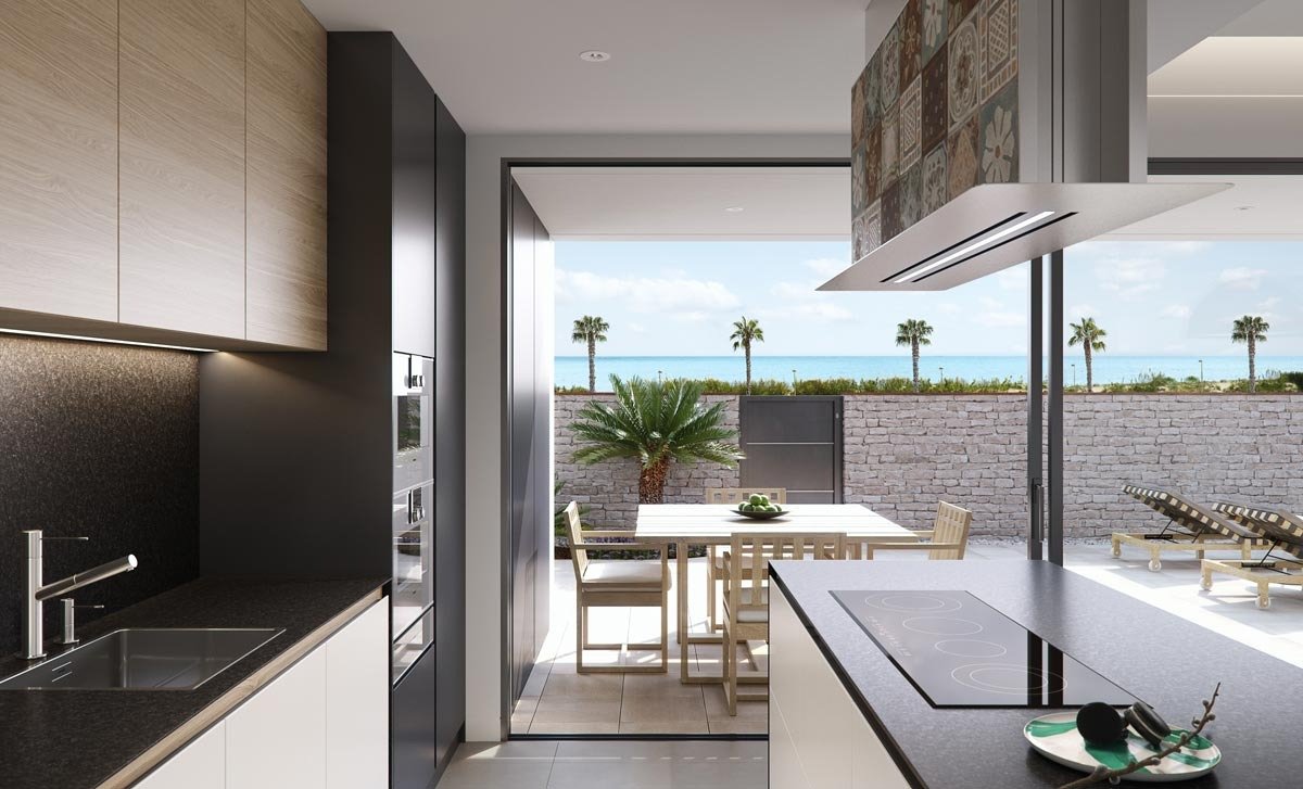 Bright modern kitchen with sleek cabinetry and ocean views at new build villas in Torre de la Horadada