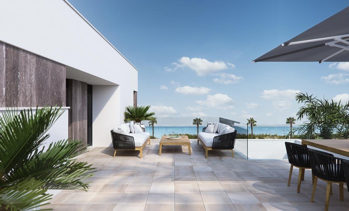 Sun-drenched terrace with modern outdoor seating and panoramic sea views at luxury new build villas in Torre de la Horadada
