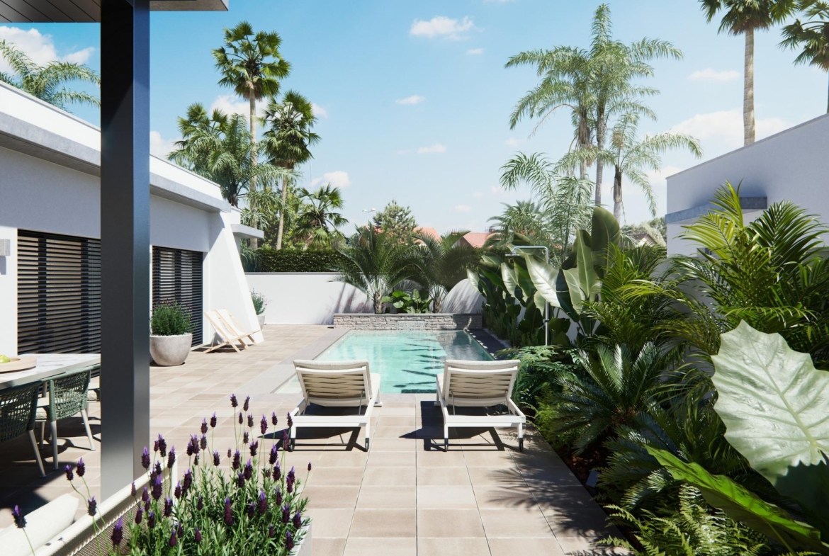 Sun-drenched terrace with lush landscaping and a sleek pool in a modern new built villa on a floor