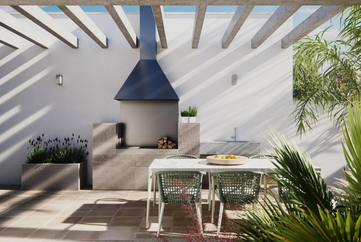 Sun-drenched outdoor dining area with modern built-in barbecue and lush greenery in new built villa on a floor