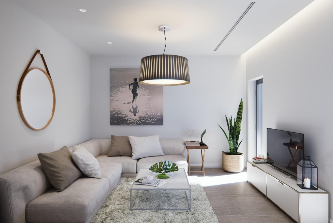 Bright, elegant living room in a new built villa on a floor featuring a spacious sofa, modern décor, and natural light.
