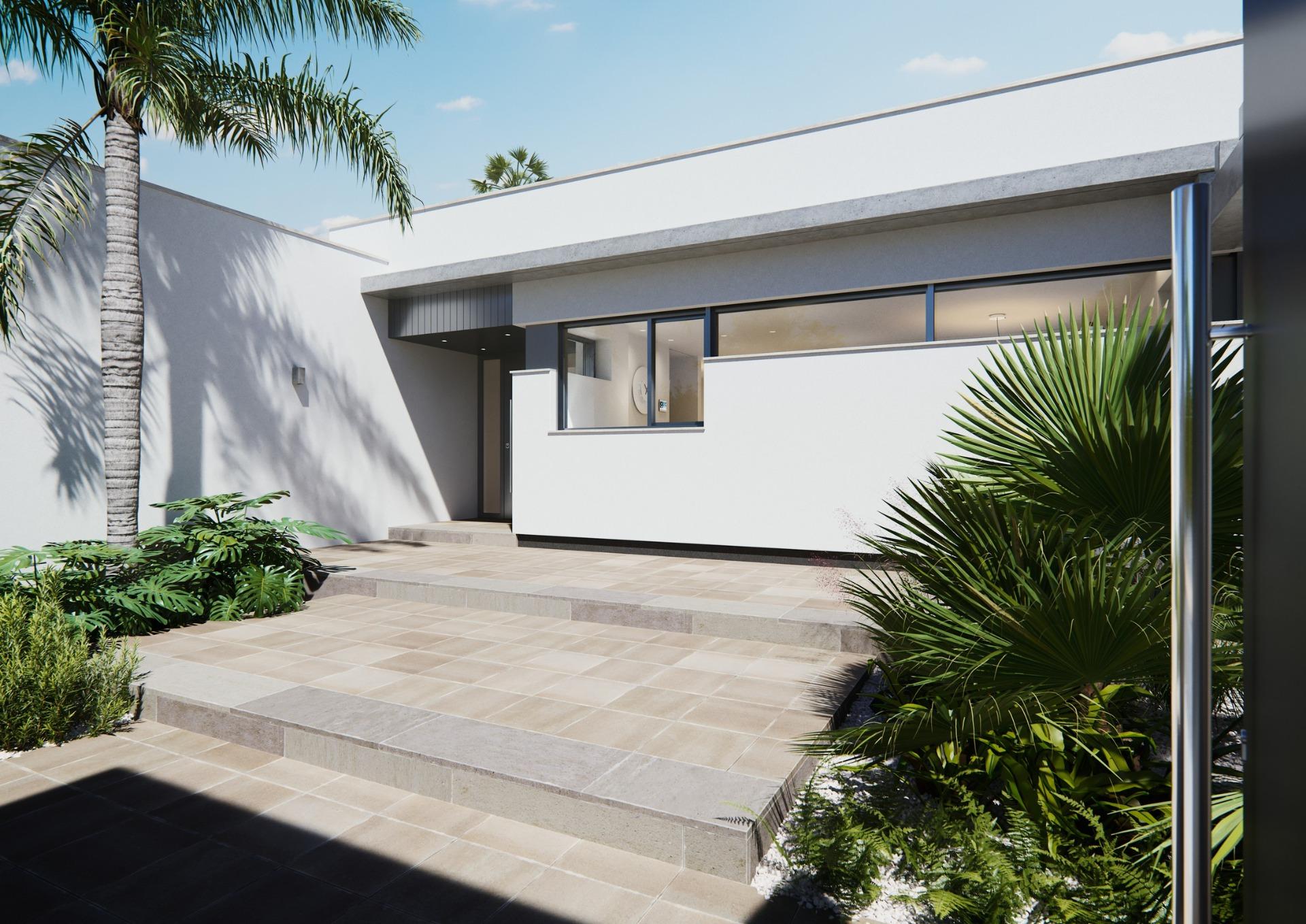 Modern new built villa exterior with sleek white facade, sun-drenched terrace, and lush tropical landscaping on a single floor.