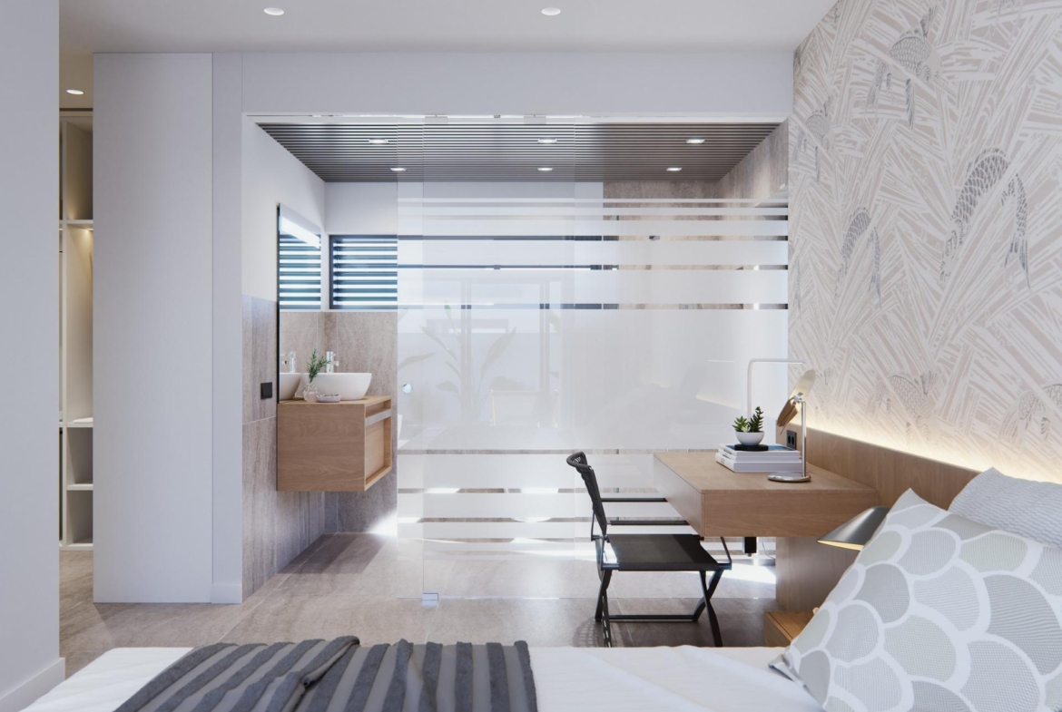 Bright and modern bedroom with built-in desk and sleek bathroom in new built villa on a floor