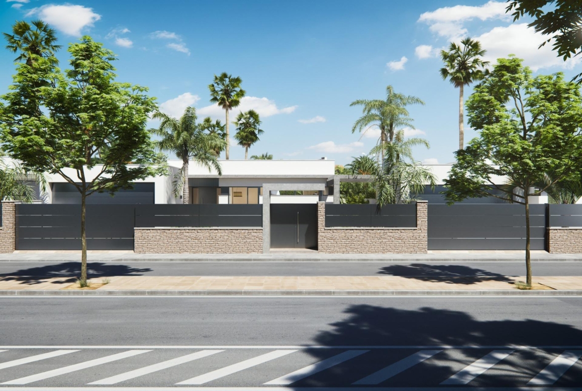 Modern new built villa on a floor with sleek white exterior, private gated entrance, and lush tropical landscaping under a bright blue sky