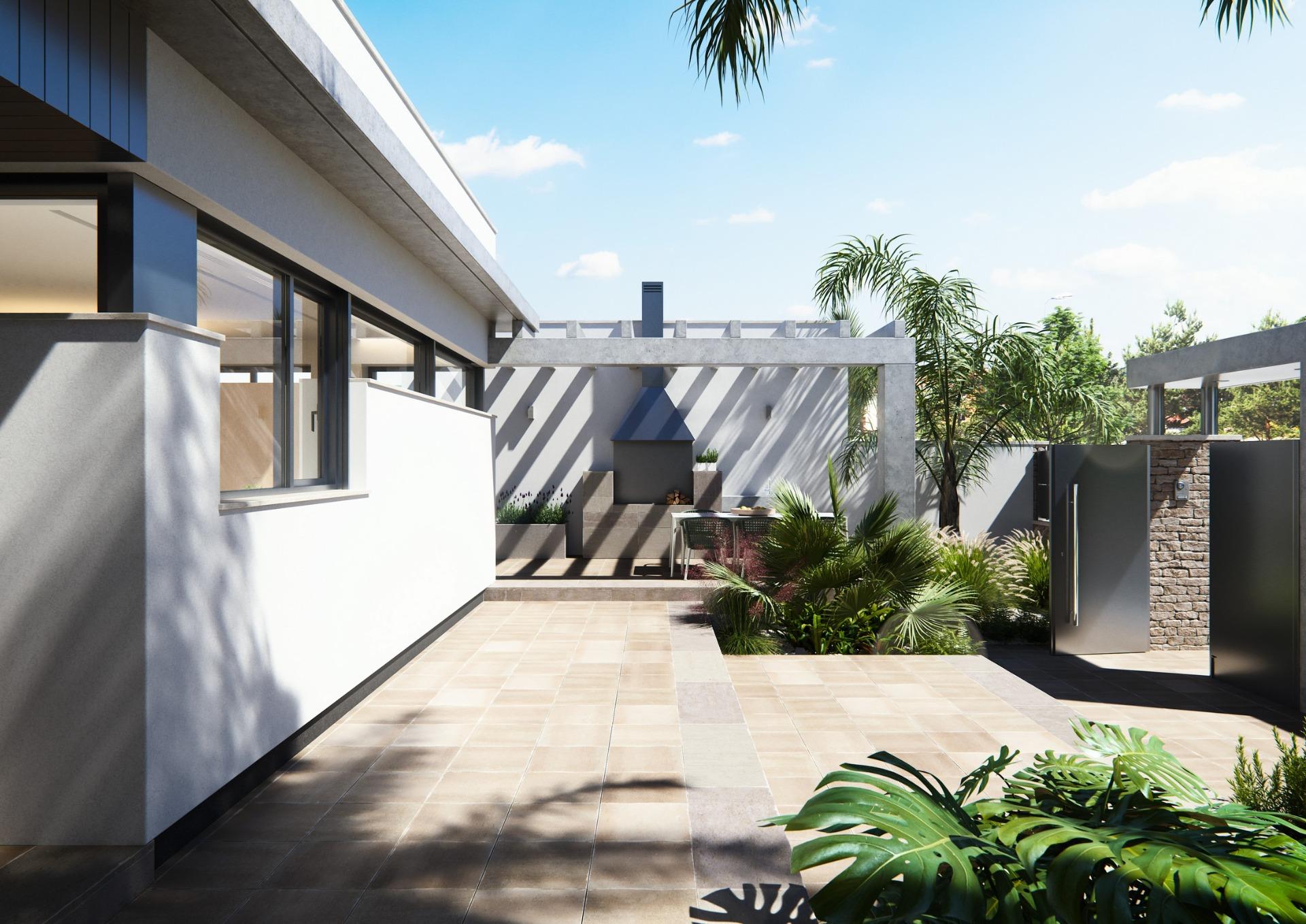 Sun-drenched terrace with modern pergola and lush landscaping at new built villa on a floor