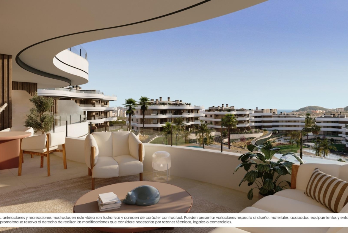 New-Build-Apartments-for-Sale-in-Finestrat-with-Sea-Views-and-Resort-Style-Amenities-10 Spacious sun-drenched terrace with elegant seating overlooking modern new build apartments and distant sea views in Finestrat.