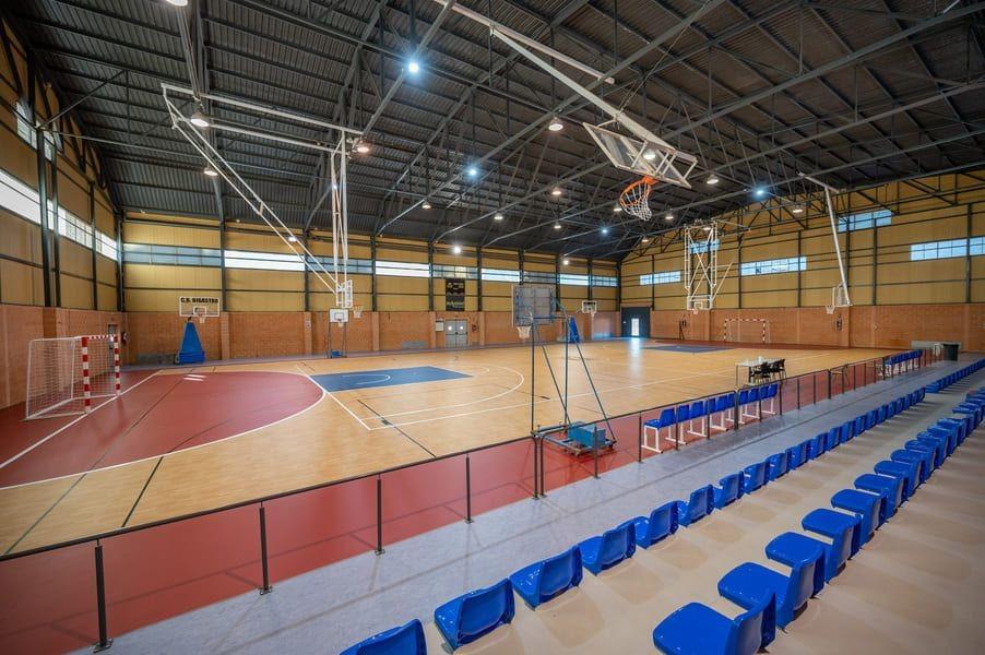 Spacious modern indoor sports court with seating, part of luxury amenities for new build 2 bedroom penthouse in Bigastro Costa Blanca