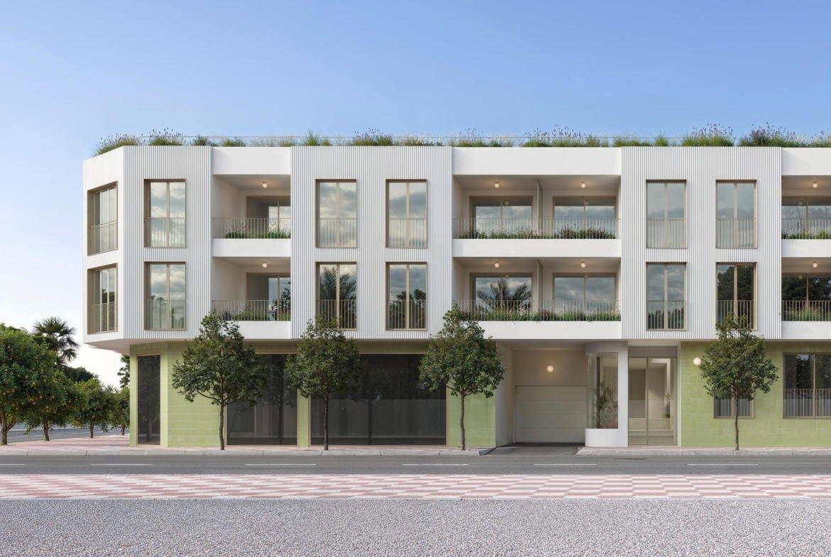 Modern, elegant new build 3-bedroom ground floor apartment with private patio in sunny Jacarilla, surrounded by greenery and open sky.