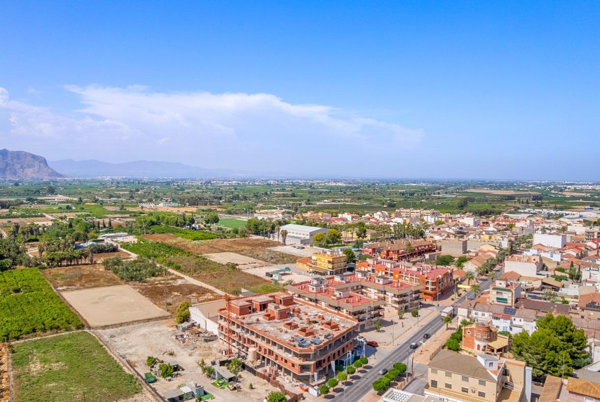 Stunning aerial view of Jacarilla featuring new build 3-bedroom ground floor apartment with private patio amidst scenic landscape
