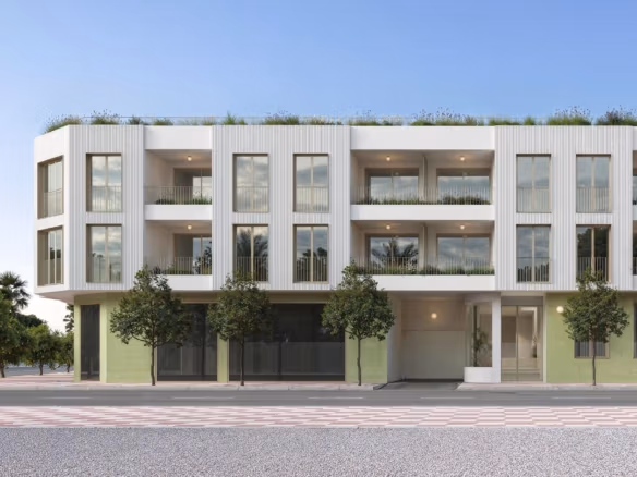 Modern new build 3-bedroom apartment exterior in Jacarilla with spacious balconies and sleek, minimalist design under clear skies