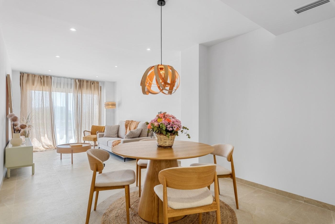 Bright modern ground floor living and dining area in a new 3-bedroom apartment with private patio in Jacarilla
